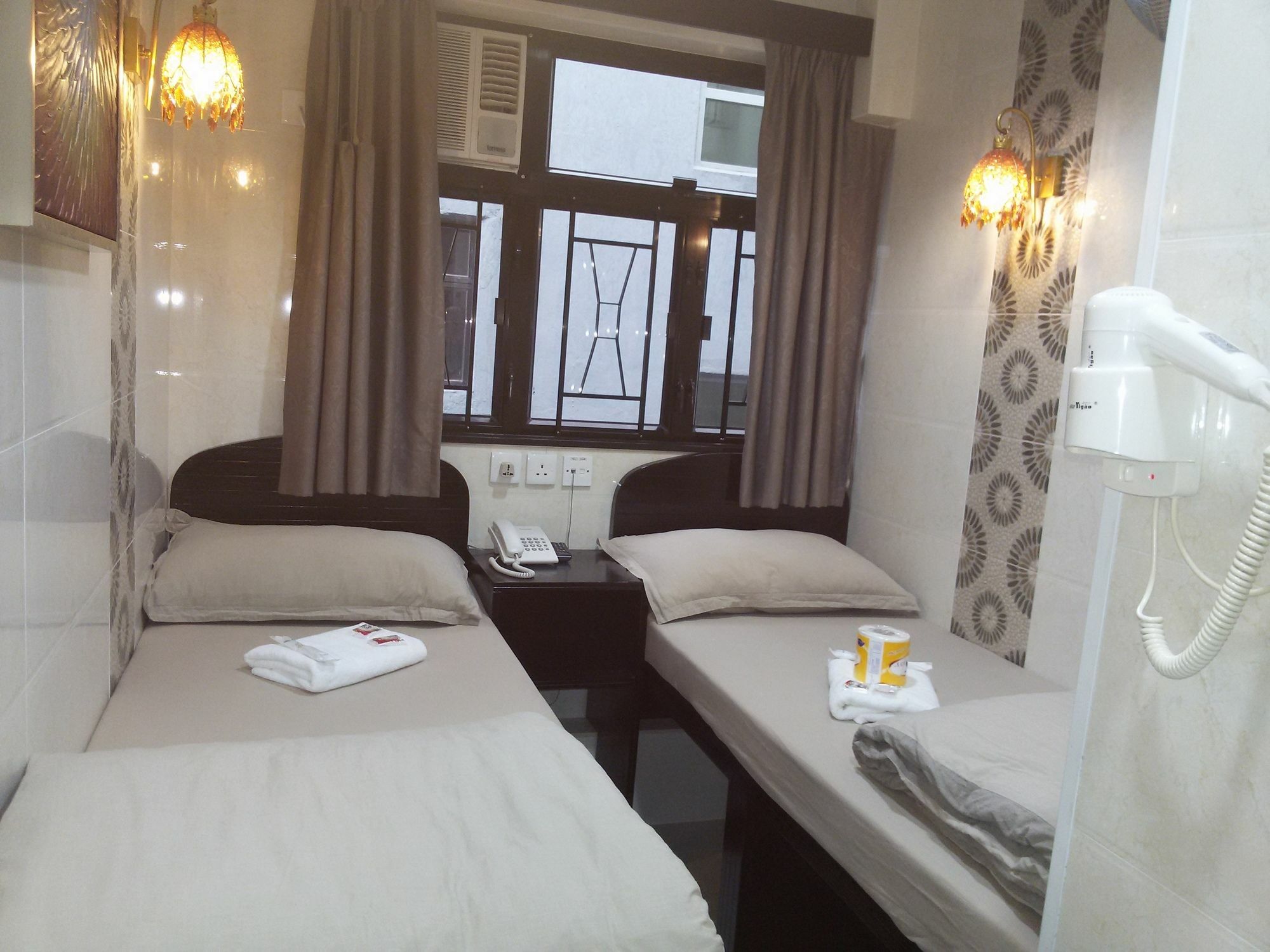 Asia Inn Цзюлун Экстерьер фото