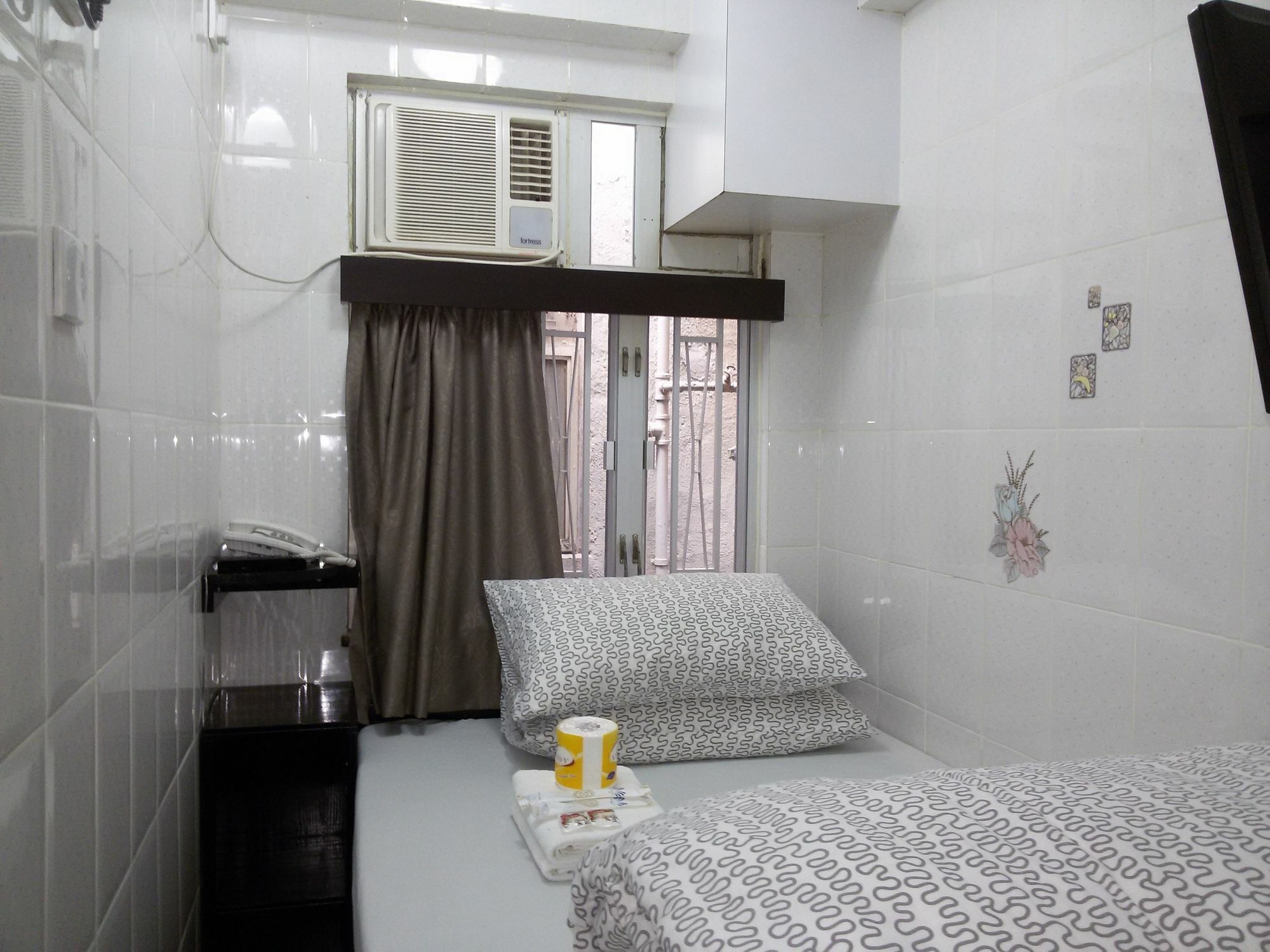 Asia Inn Цзюлун Экстерьер фото